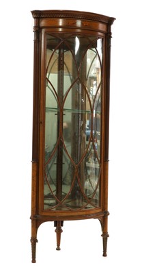 Lot 390 - An Edwardian corner vitrine