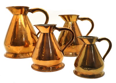 Lot 140 - A graduated set of four copper haystack measures