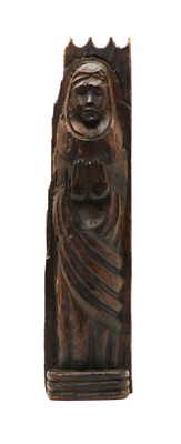 Lot 240 - A carved oak panel