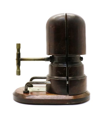 Lot 107 - A hat stretcher with adjustable crank