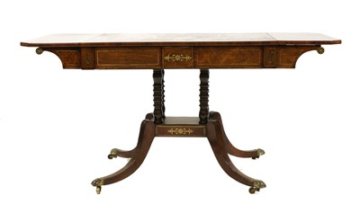 Lot 204 - A 19th century brass inlaid rosewood sofa table