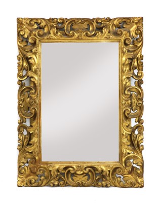 Lot 456 - A wall mirror with pierced gilt frame