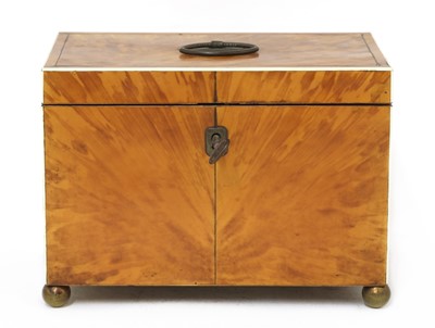Lot 201 - A blond tortoiseshell twin compartment tea caddy