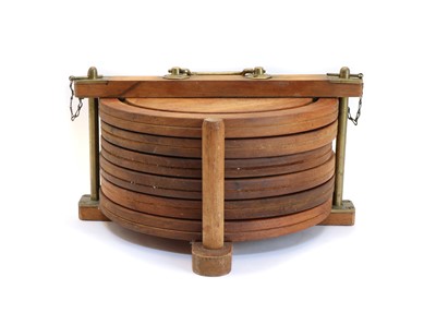 Lot 132 - A set of six teak stacking trencher plates