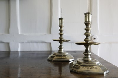 Lot 206 - A pair of Chinese paktong pricket candlesticks