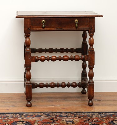 Lot 225 - A fruitwood lowboy