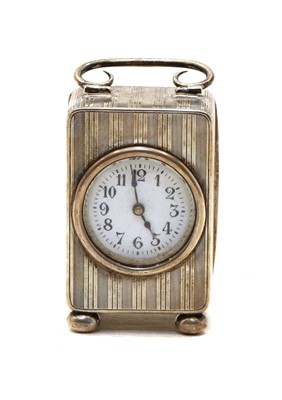Lot 14 - A silver miniature carriage clock
