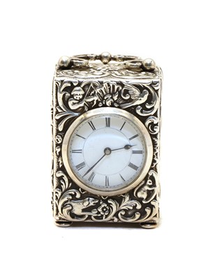 Lot 9 - A late Victorian silver miniature carriage clock