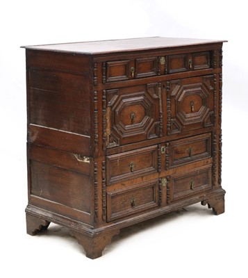 Lot 209 - An oak transitional chest