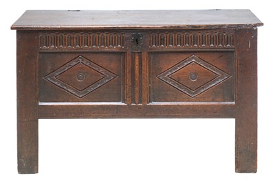 Lot 223 - An oak coffer