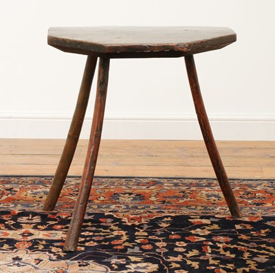 Lot 221 - A primitive elm and ash 'cheese top' cricket table