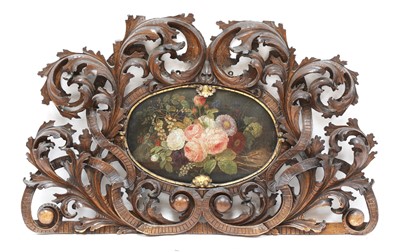 Lot 231 - An ornately pierced and carved headboard