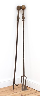Lot 224 - An oversize brass and steel log hook