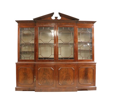 Lot 437 - A George III style mahogany breakfront bookcase