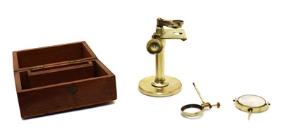 Lot 65 - A mahogany cased lacquered brass microscope
