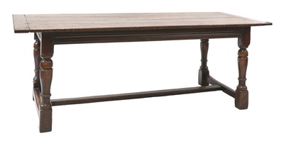 Lot 654 - An oak refectory table