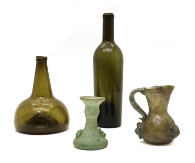 Lot 105 - An 18th century green glass bottle