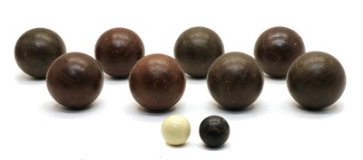 Lot 317 - A matched set of eight bocce or bowls
