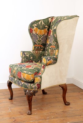 Lot 670 - A Queen Anne wingback armchair