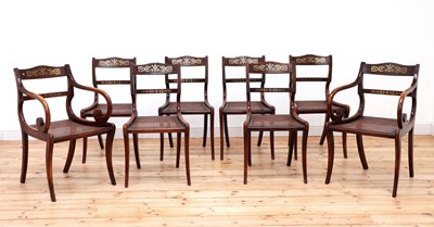 Lot 109 - A set of eight simulated rosewood dining chairs