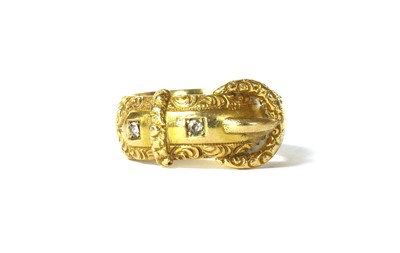 Lot 4 - A late Victorian 18ct gold diamond set buckle ring