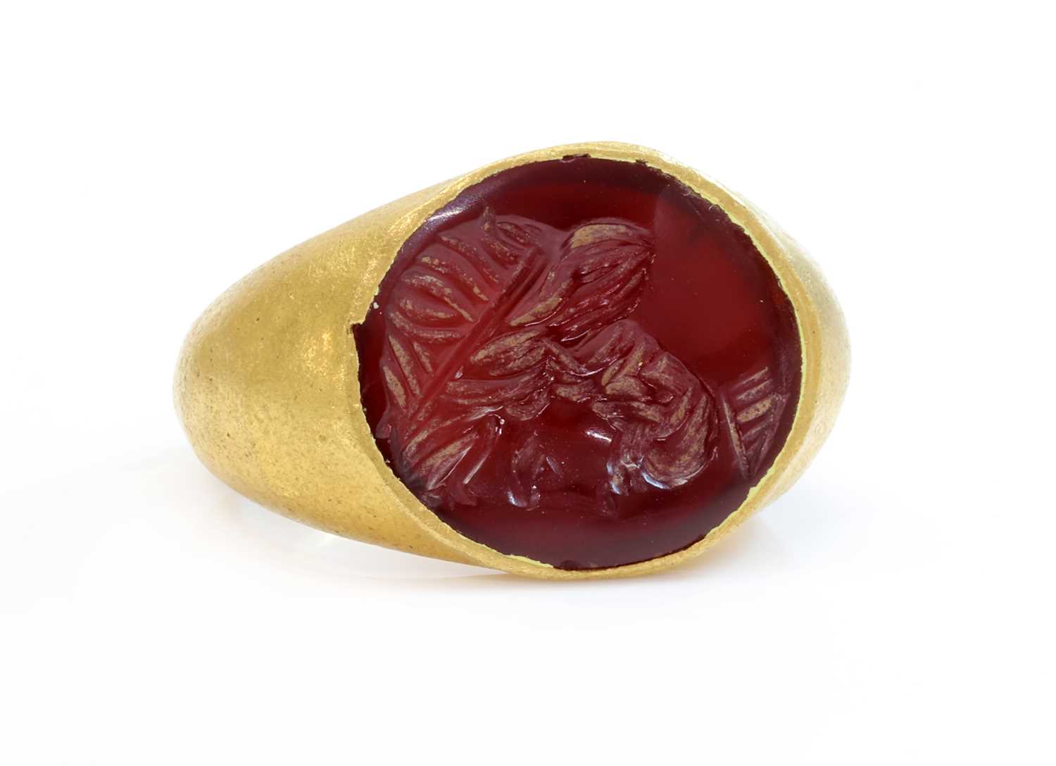 Lot 7 - A Roman hollow gold hardstone intaglio ring