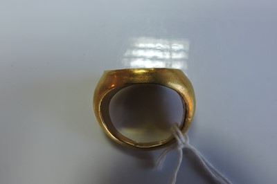 Lot 4 - A Roman hollow gold hardstone intaglio ring