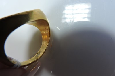 Lot 4 - A Roman hollow gold hardstone intaglio ring