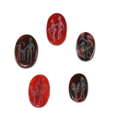 Lot 222 - Sixteen oval carved cornelian intaglios