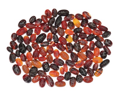 Lot 221 - A large quantity of oval carved cornelian intaglios