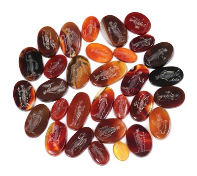 Lot 219 - A large quantity of oval carved cornelian intaglios