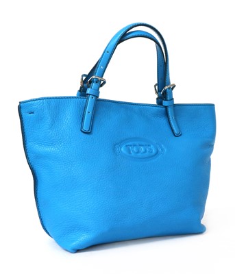 Lot 279 - A Tods small blue leather shopper tote