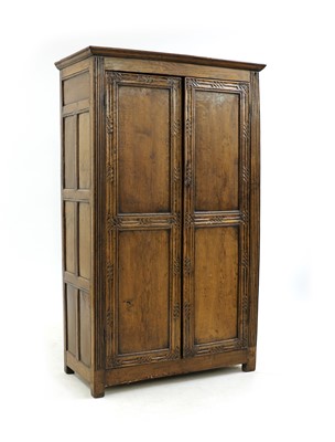 Lot 447 - A small oak hall robe