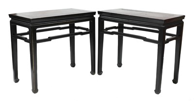 Lot 489 - A pair of Chinese ebonised and parcel-gilt hardwood low tables