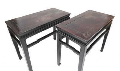 Lot 489 - A pair of Chinese ebonised and parcel-gilt hardwood low tables