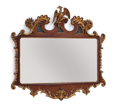 Lot 492 - A large George II-style mahogany and parcel-gilt mirror