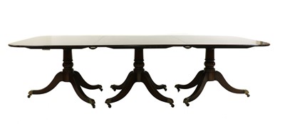 Lot 371 - A Regency-style mahogany triple pedestal dining table