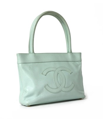 Lot 256 - A Chanel baby blue leather small Monte Carlo tote