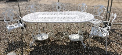 Lot 469 - A Victorian style garden dining suite