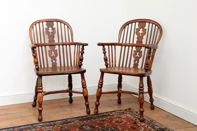 Lot 428 - A pair of yew and elm low hoop back Windsor chairs