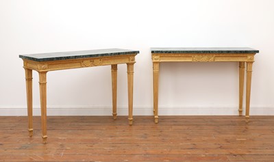 Lot 8 - A pair of giltwood console tables in the manner of Robert Adam