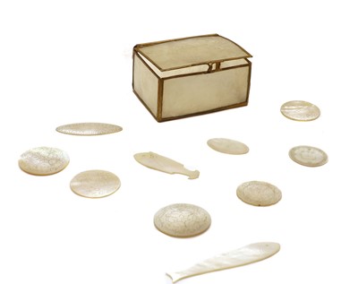 Lot 141 - Twenty six Chinese engraved mother of pearl gaming counters