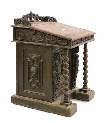 Lot 391 - A 19th Century oak davenport