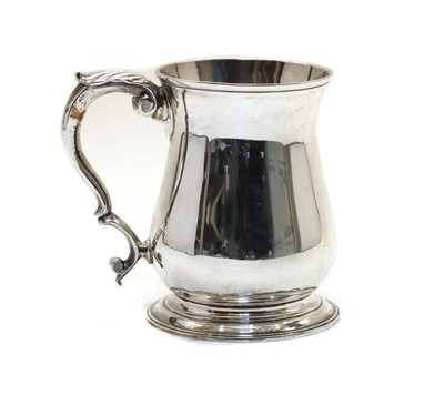 Lot 46 - A George ll silver baluster tankard