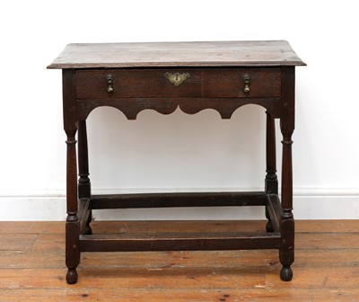 Lot 519 - An oak side table