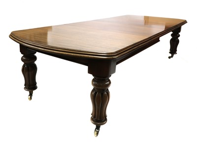 Lot 111 - A Victorian walnut extending dining table