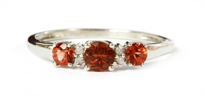 Lot 160 - An 18ct gold gem-set and diamond ring