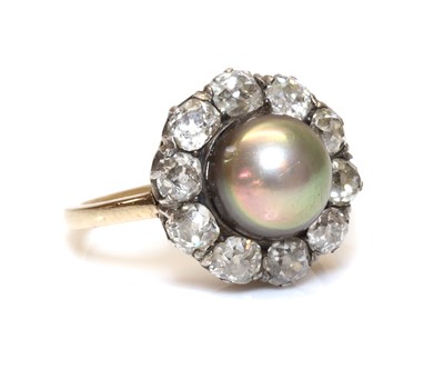 Lot 147 - A Continental natural saltwater pearl and diamond cluster ring, c.1890