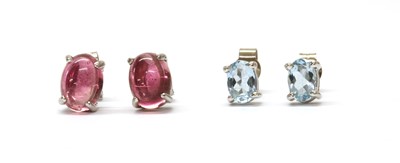 Lot 1392 - A pair of 18ct white gold single stone aquamarine stud earrings