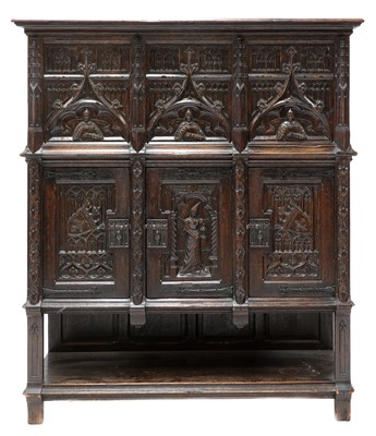 Lot 537 - A Gothic-style oak cupboard